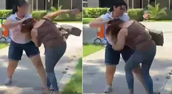 Kocasıyla birlikte bastığı kadını saçından sürükledi