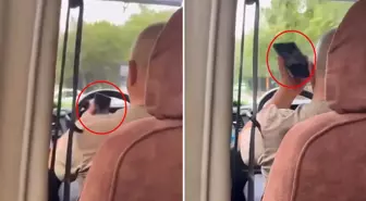 Minibüs şoförü yolculara aldırış etmeden cinsel içerikli film izledi