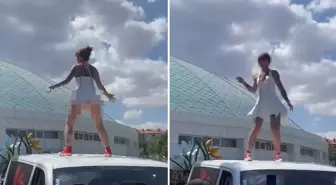 Bu nasıl fuar? Kadını onlarca erkeğin gözü önünde aracın üstüne çıkarıp...