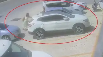 El freni çekilmeyen otomobili tek eliyle durdurdu