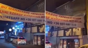 Mahalleyi karıştıran pankart! Telefon kodu dikkatlerden kaçmadı