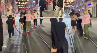 İstiklal Caddesi'nde hareketli gece! Laf atan adamı tekme tokat dövdüler