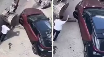 İş makinesi ile araç çekmeye kalktılar, ellerine yüzlerine bulaştırdılar