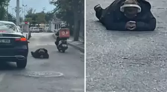 Dünya umurunda değil! Yolun ortasına uzanıp yaptığına bakın