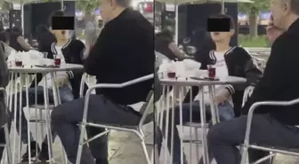 Vahim görüntüler! Küçücük çocuk ailesinin yanında sigara içti, bir de halka çıkardı