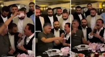 MHP Ankara İl Başkanı, Latif Doğan'ın başından aşağı desteyle para yağdırdı