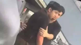 İzmir metrosunda panik: Yolculara küfür edip kapılara vurdu