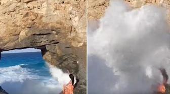 Fotoğraf uğruna canından oluyordu: Dev dalga turisti denize sürükledi