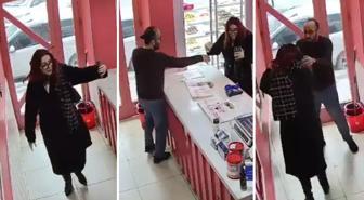 Elinde telefonla dükkana girdi, yaptıklarına kimse anlam veremedi