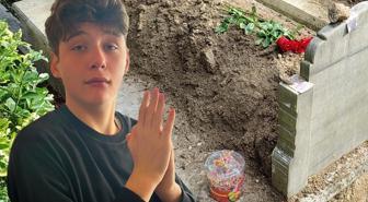 Arkadaşları Atlas'ın mezarına gül ve şeker bıraktı