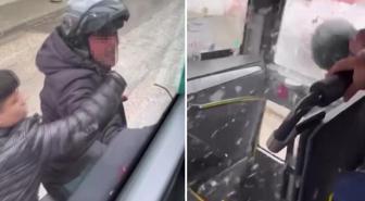 Trafikte tartıştığı servis aracının camını kaskıyla kırdı