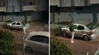 Camlarını kırdığı otomobile ışıklı çiçek buketi fırlattı; o anlar kamerada