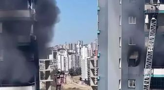 Apartmanda çıkan yangında mahsur kalan baba ve bebeğini inşaat işçisi kurtardı