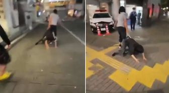 Uygunsuz durumda yakaladığı eşini sokakta sürükleyerek polis karakoluna götürdü