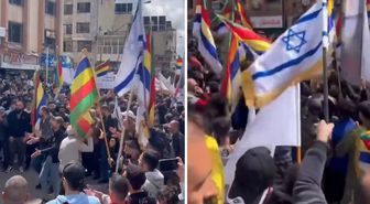 Suriye'nin güneyinde bir grup Dürzi, ülkeden ayrılma talebiyle İsrail bayraklı gösteri düzenledi