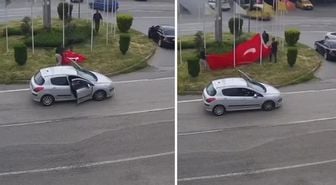Rüzgarda ipi kopan Türk bayrağını vatandaşlar korudu