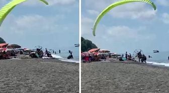 Plajda kontrolden çıkan motorlu paraşüt kalabalığa daldı: 3 yaralı