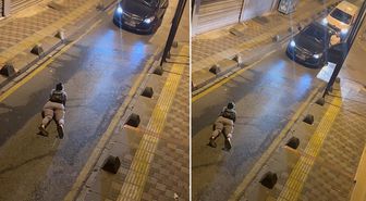 İstanbul'da ilginç görüntü! Yolun ortasına yatıp telefonuyla oynadı