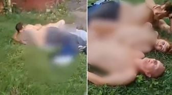 Çimlerin üzerinde mide bulandıran görüntü! Çevredekilere aldırış etmediler