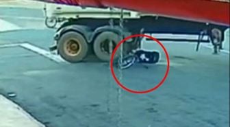 Dev kamyonun altında sürüklendi, burnu bile kanamadan kurtuldu