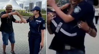 Kadın polisi kucağına alıp döndürdü! Tepki çeken görüntülere ağır yaptırım