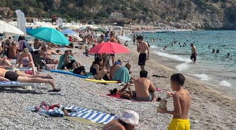 Eylül sonunda Fethiye'de deniz suyu 28 derece! Ölüdeniz sahilleri tatilcilerle doldu