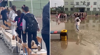 Okul bahçesi yağmur sonrası göle döndü: Öğrenciler sıralardan geçiş yolu yaptı