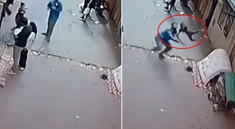 Pencereden düşen çocuğu son anda yakaladı