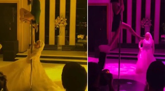 Tartışma yaratan görüntü! Tesettürlü gelin, direk dansı yapan dansçıya eşlik etti