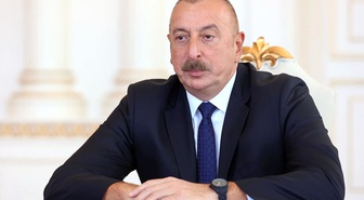 Başörtüsü yasağına tepki gösteren Oktay Saral'a Azerbaycan'dan yanıt
