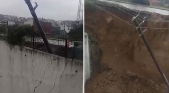 Gölcük'te sağanak sonrası istinat duvarı çöktü, elektrik direği yan yattı