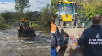 Çatalca'da taşan dere ambulansın yolunu kesti! Kolu kırılan kadın kepçeyle karşıya geçirildi