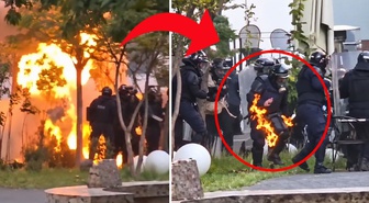 Tiran'da göstericiler bakanlık ve bankaları ateşe verdi, polis alevler içinde kaldı