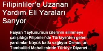 Filipinliler'e Uzanan Yardım Eli Yaraları Sarıyor