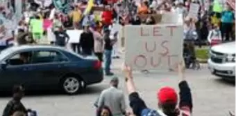 Koronavirüs tedbirlerini protesto eden grubun lideri Covid-19'a yakalandı