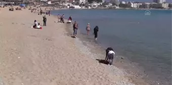 Didim'de güneşli hava sahili hareketlendirdi