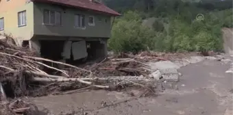 Selde evde mahsur kalan komşularını sırtında taşıyarak kurtaran Halil Özdemir, yaşadıklarını anlattı