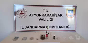 Afyonkarahisar'da Yakalama Kararı Bulunan Şahıs ve Yasaklı Maddeler Ele Geçirildi