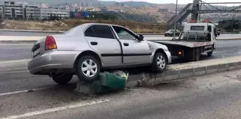 Refüje çıkan otomobildeki 2 kişi yaralandı