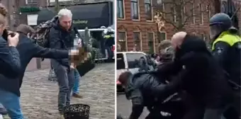 Hollanda'da Kur'an-ı Kerim'in yakılmasına engel olmak isteyen protestoculara polisten sert müdahale