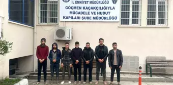 Hatay'da 12 kaçak göçmen yakalandı, 1 kişi tutuklandı