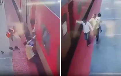 Trene yetişmeye çalışırken kucağındaki çocukla tren ve peron arasında sıkıştı