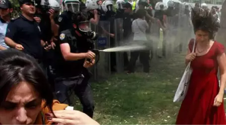 Gezi Parkı'nda 'Kırmızılı Kadının' Yüzüne Biber Gazı Sıktıran Ramazan Emekli Hakkında Yakalama Kararı Çıkarıldı