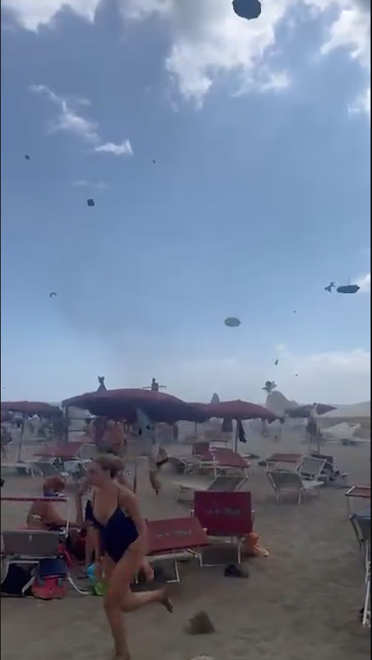 Hortum, plajı savaş alanına çevirdi: Turist canını zor kurtardı