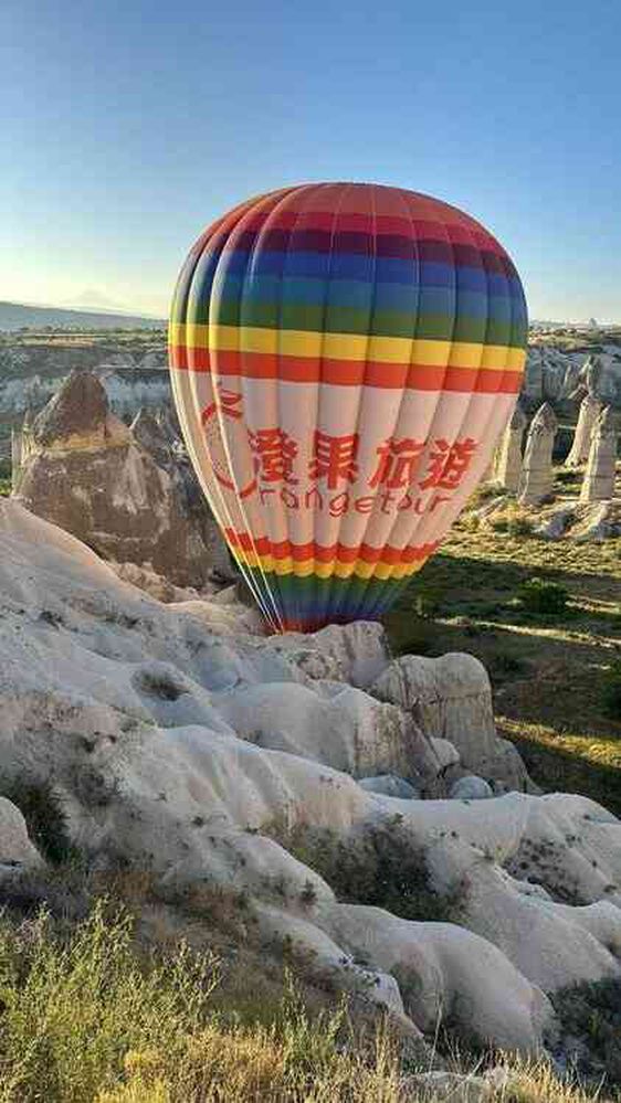 Yüzlerce metre yüksekte korku dolu anlar! Balon pilotu 20 kişinin hayatını kurtardı