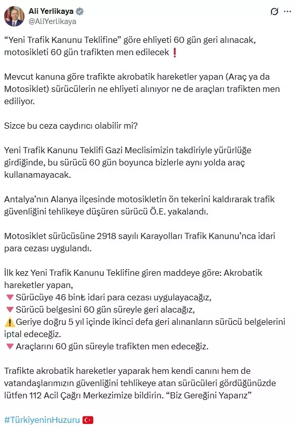 Trafikte akrobatik hareket yapan motosiklet sürücüsü