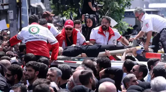 Tehran has never seen such a crowd! There was a stampede at the funeral of the leader, and people fainted.