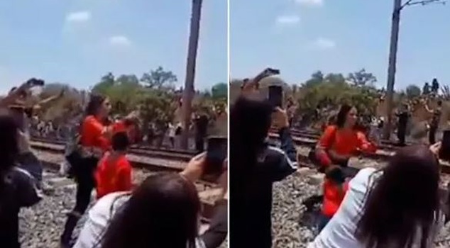 A woman who wanted to take a selfie on the train tracks was hit by a ...