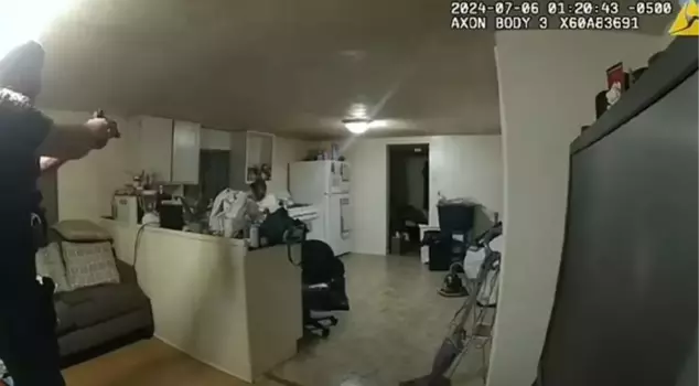 The black woman was killed by the police who told her to drop the pot of hot water she was holding in her kitchen.