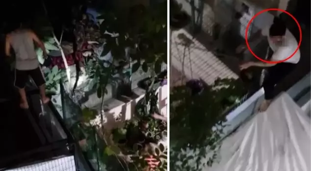 The intoxicated woman hanging from the window fell from the fifth floor when the police arrived.